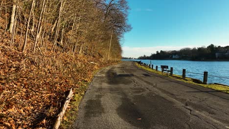 tracking forward along the shoreline path of mona lake