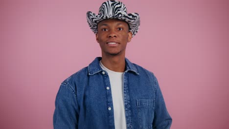 man in zebra print cowboy hat