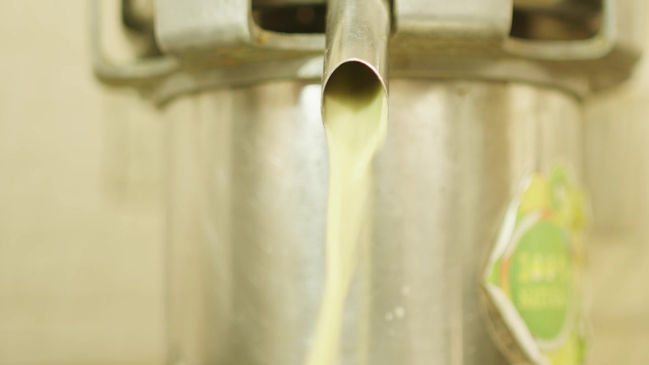 Fresh Juice Pouring from Juice Making Machine 2
