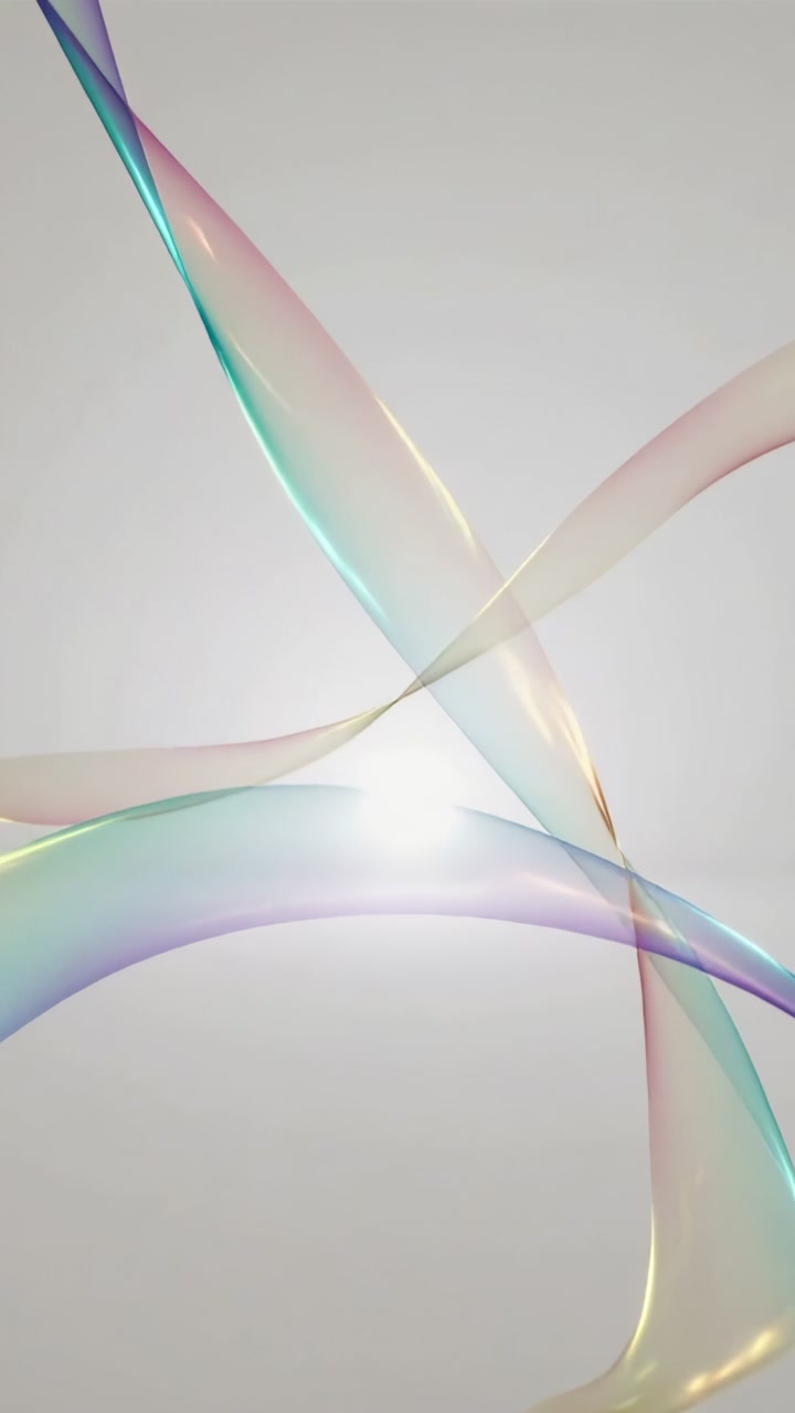 Vertical video: Entering ribbons curving toward center glow over gray backdrop creating highlights