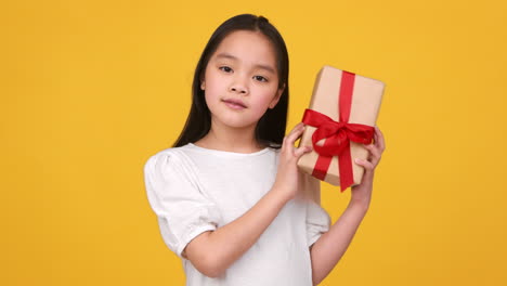 girl holding a gift