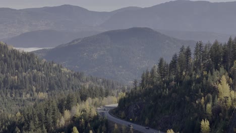 Autumn-Drive:-Aerial-Footage-of-Cars-Moving-Along-Highway-24,-Little-Fort-in-British-Columbia