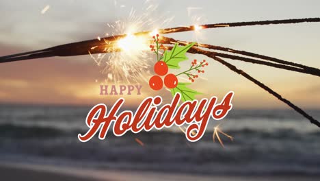 Animation-of-happy-holidays-text-over-sparklers-at-beach