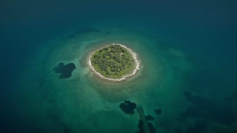 aerial view of the st. athanasios island in the gulf of corinth, greece.