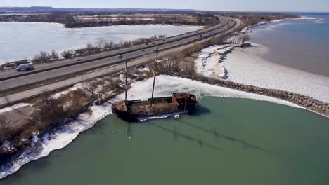 Wreck-of-Grande-Hermine-ship-replica-in-Canada,-wide-spinning-aerial