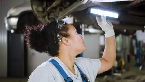 Woman-inspecting-automobile