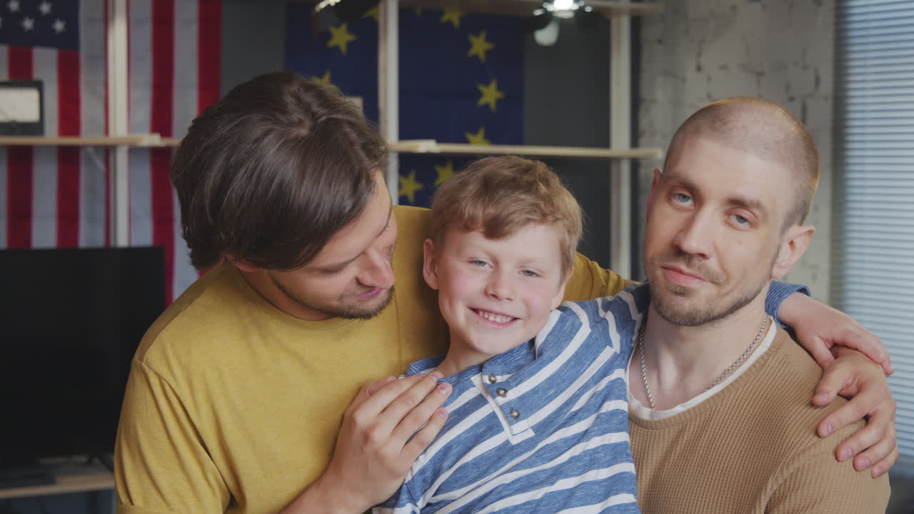 Happy Fathers Posing with Son