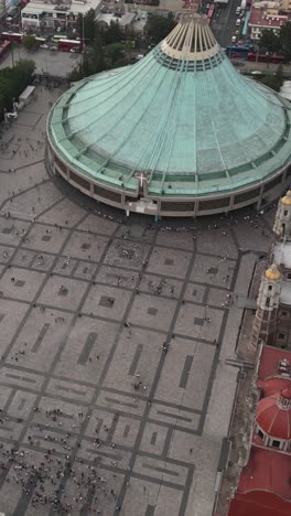 Aerial-view-of-the-sacred-Basilica-of-the-Virgin-of-Guadalupe-crowded-with-visitors-on-weekend