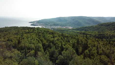 Aerial-view-of-mountain-by-the-side-of-St-Laurence-Golf-in-Gaspesie-Quebec-Canada