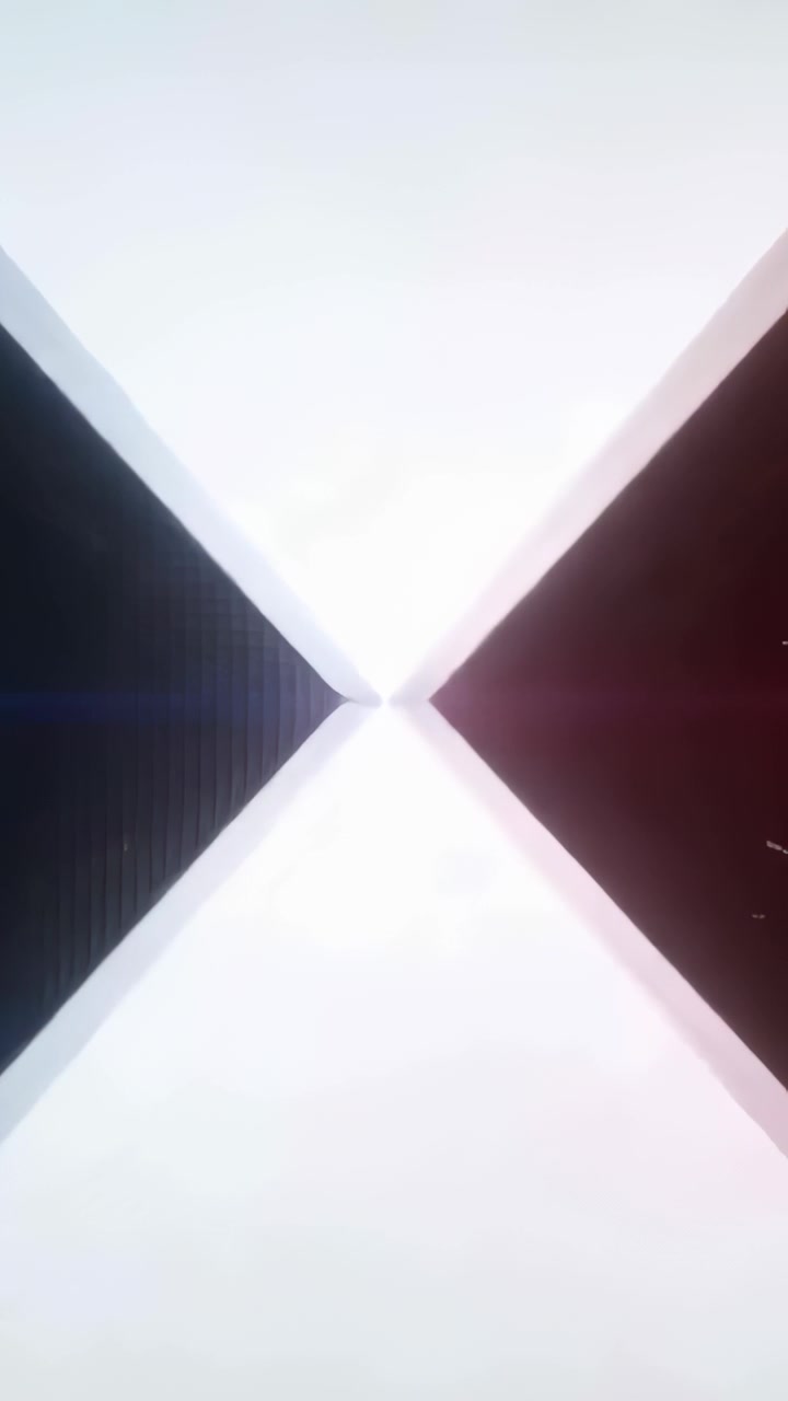 Vertical video: Playback starting X pulsing, shifting on screen with center glow, maroon transition
