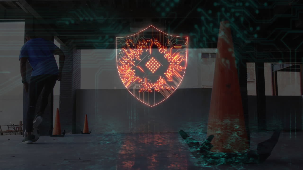 Male adult practicing soccer dribbling in sports training facility, with digital shield hologram