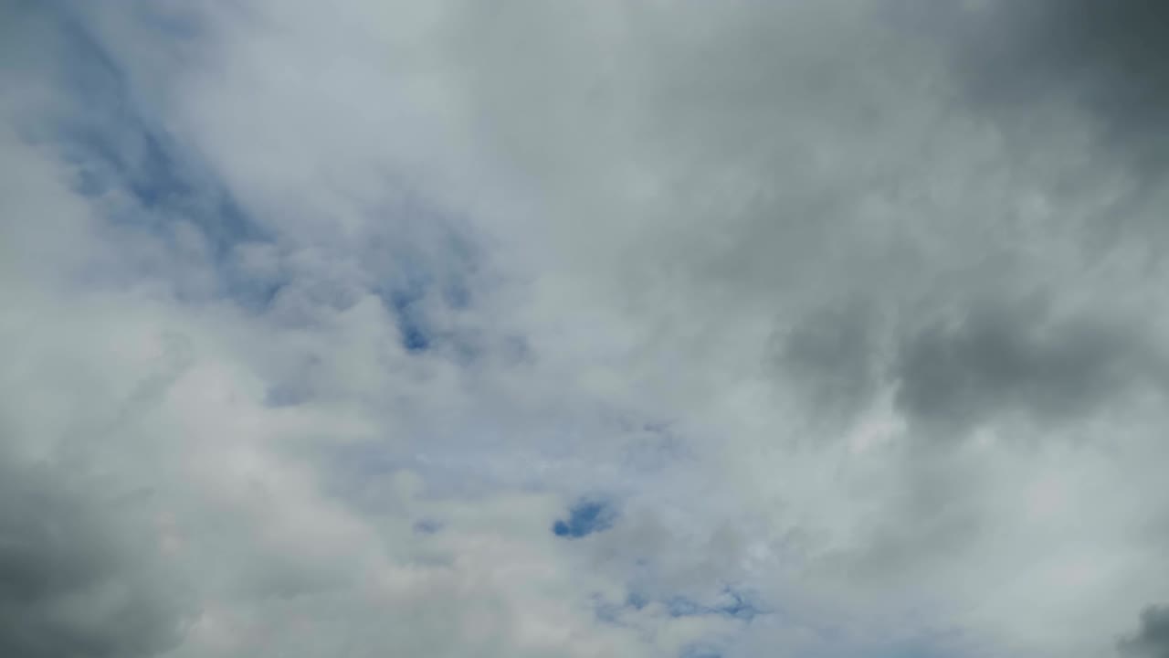 Gray Rain Clouds are Moving in the Sky. TimeLapse
