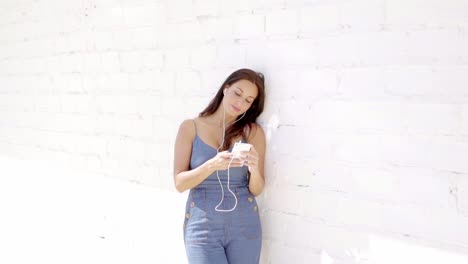 young woman relaxing listening to her music