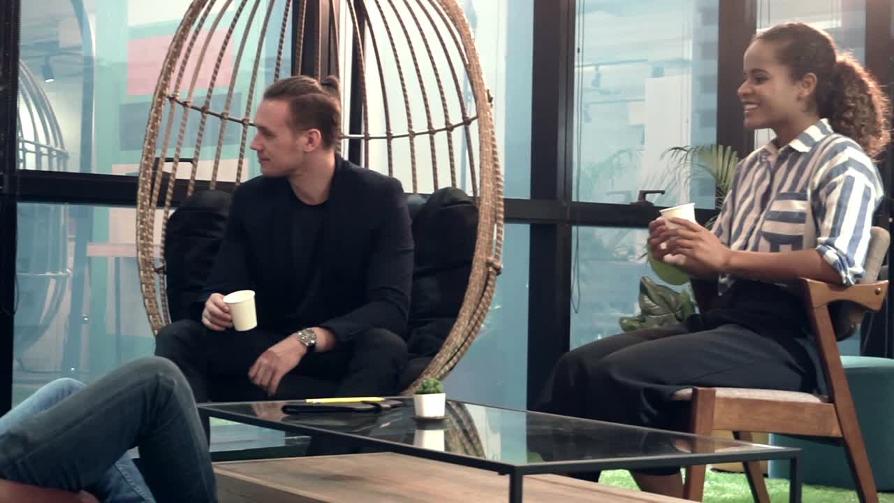 Office worker relax at coffee corner while taking a short break from work.