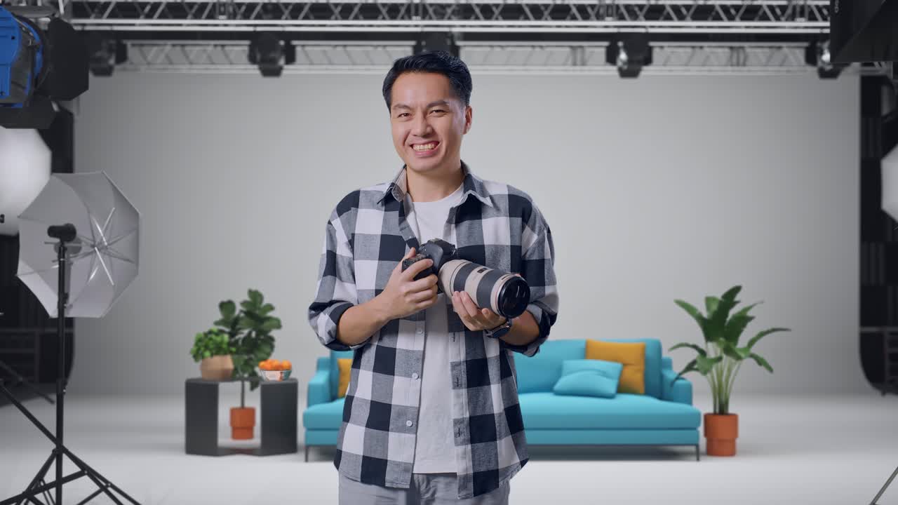 Photographer Posing with Camera in Studio