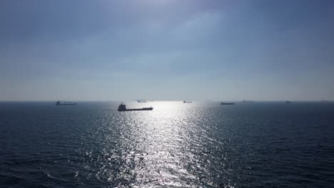 ships at sea on a sunny day