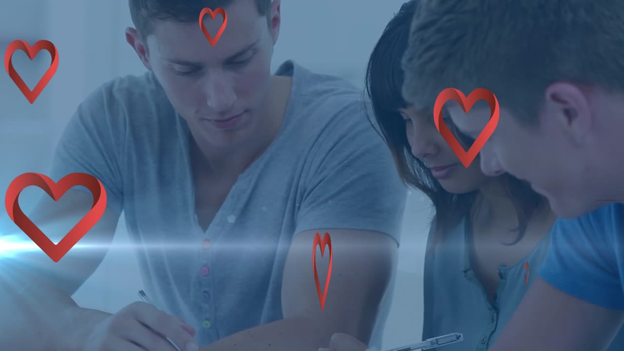Red heart icons and spot of light over two caucasian boys and a girl studying at college