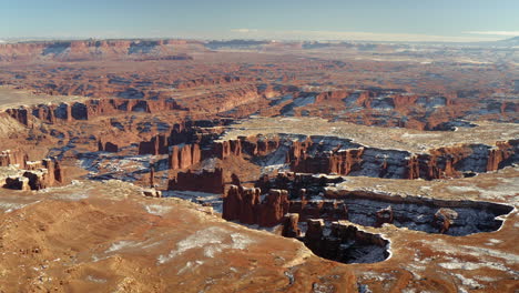 vast winter landscape of red rock canyons and mesas