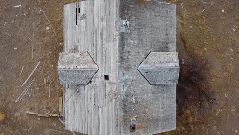 top view of an old torn-up abandoned house in the country near empress alberta canada during the day