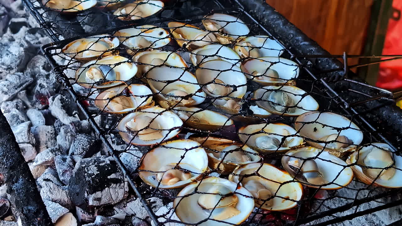 Cockles Grilled Over Coals At Kedonganan Fish Market In Bali, Indonesia. - closeup shot