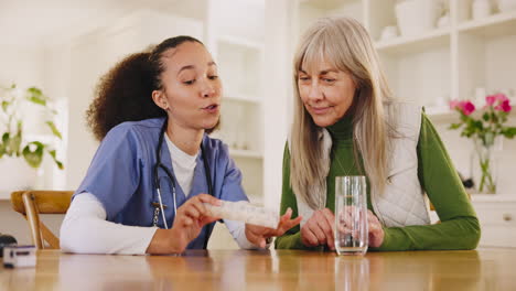 Senior-woman,-pills-and-nurse-in-home-helping