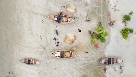 top view of bangladeshi wooden boats with local fishermen