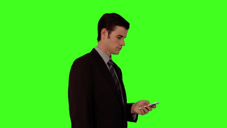 Businessman-using-his-smartphone