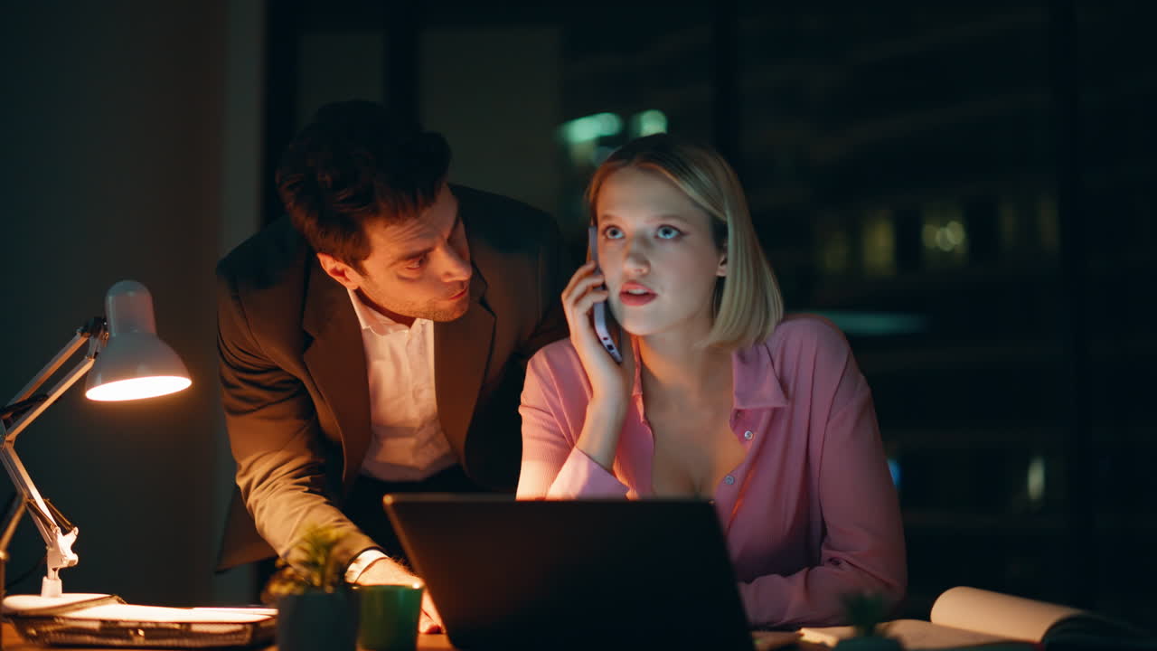 Business people working late at the office