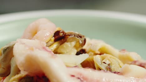 seafood dish with squid, shrimp, and mussels