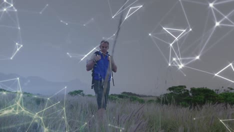 caucasian senior man hiking in countryside, over moving network of connections