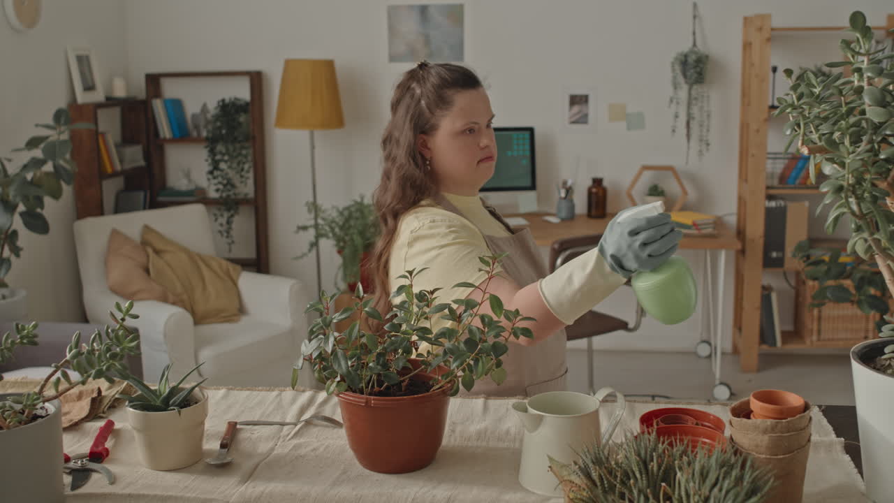 Woman with Down Syndrome Gardening Indoors