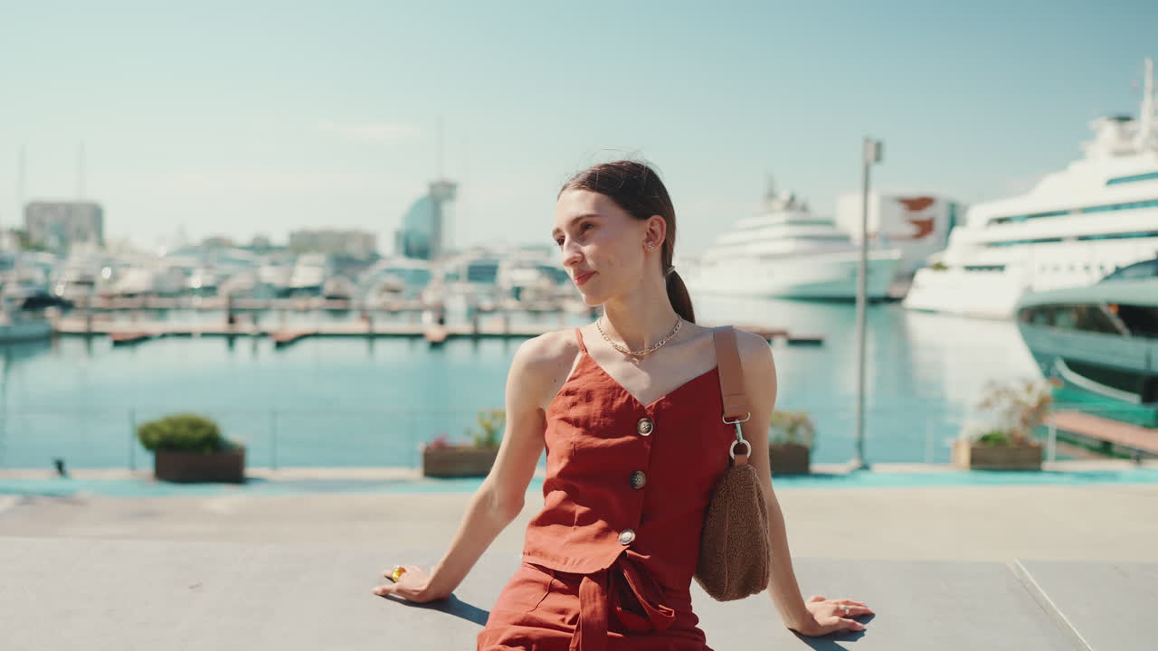 Woman at the marina with yachts