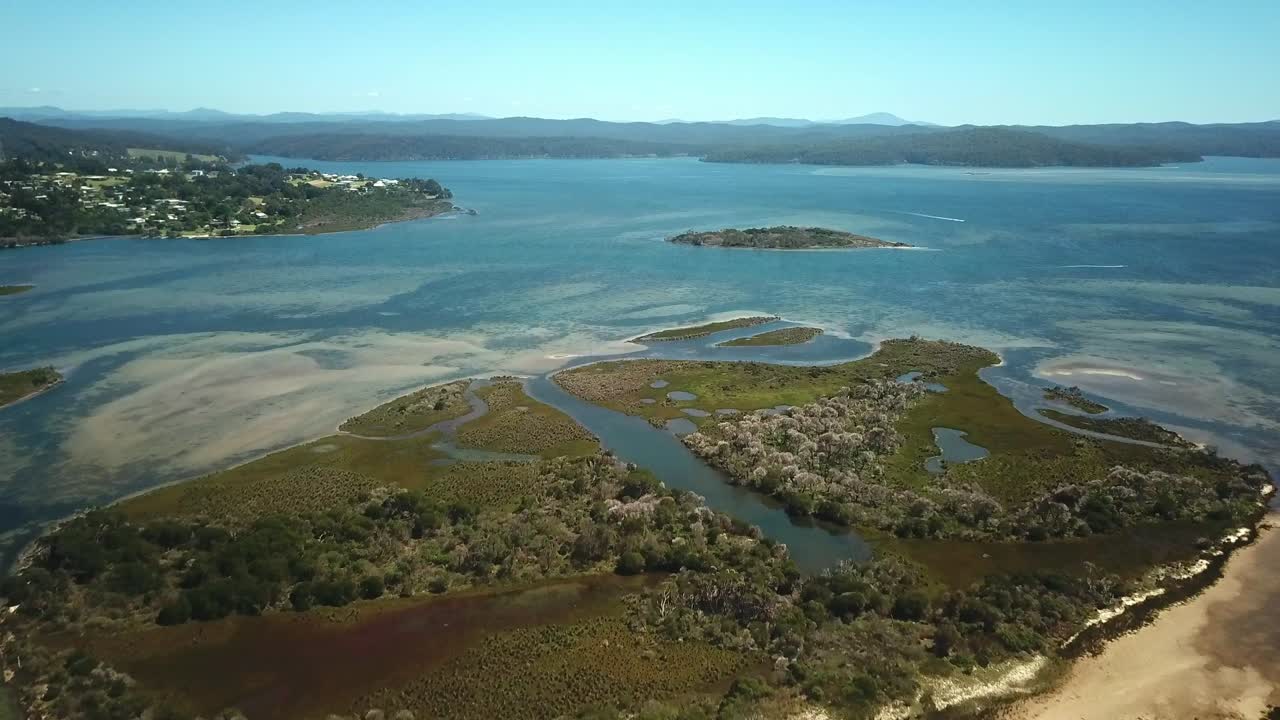 Drone view over Goat Island in the Mallacoota Inlet at low tide, in eastern Victoria, Australia, December 2020