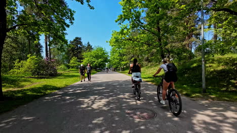 cycling in a sunny park
