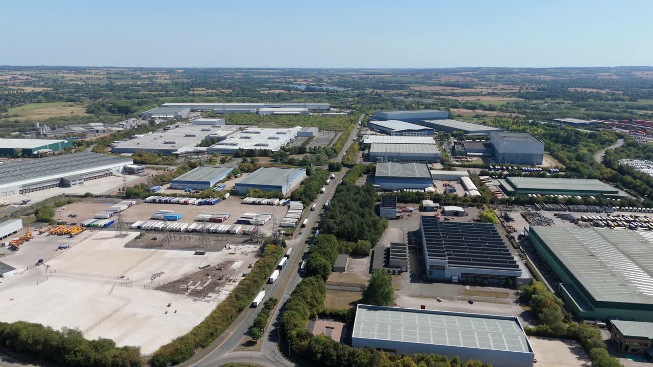 Aerial View of Industrial Park with Warehouses and Transportation