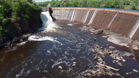 Low-tilting-up-shot-of-the-Saint-Croix-Falls-Hydro-Electric-Dam-in-Wisconsin