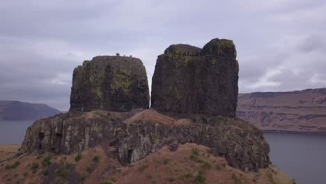 Aerial-orbits-volcanic-rock-spires,-Twin-Sisters-on-Columbia-River