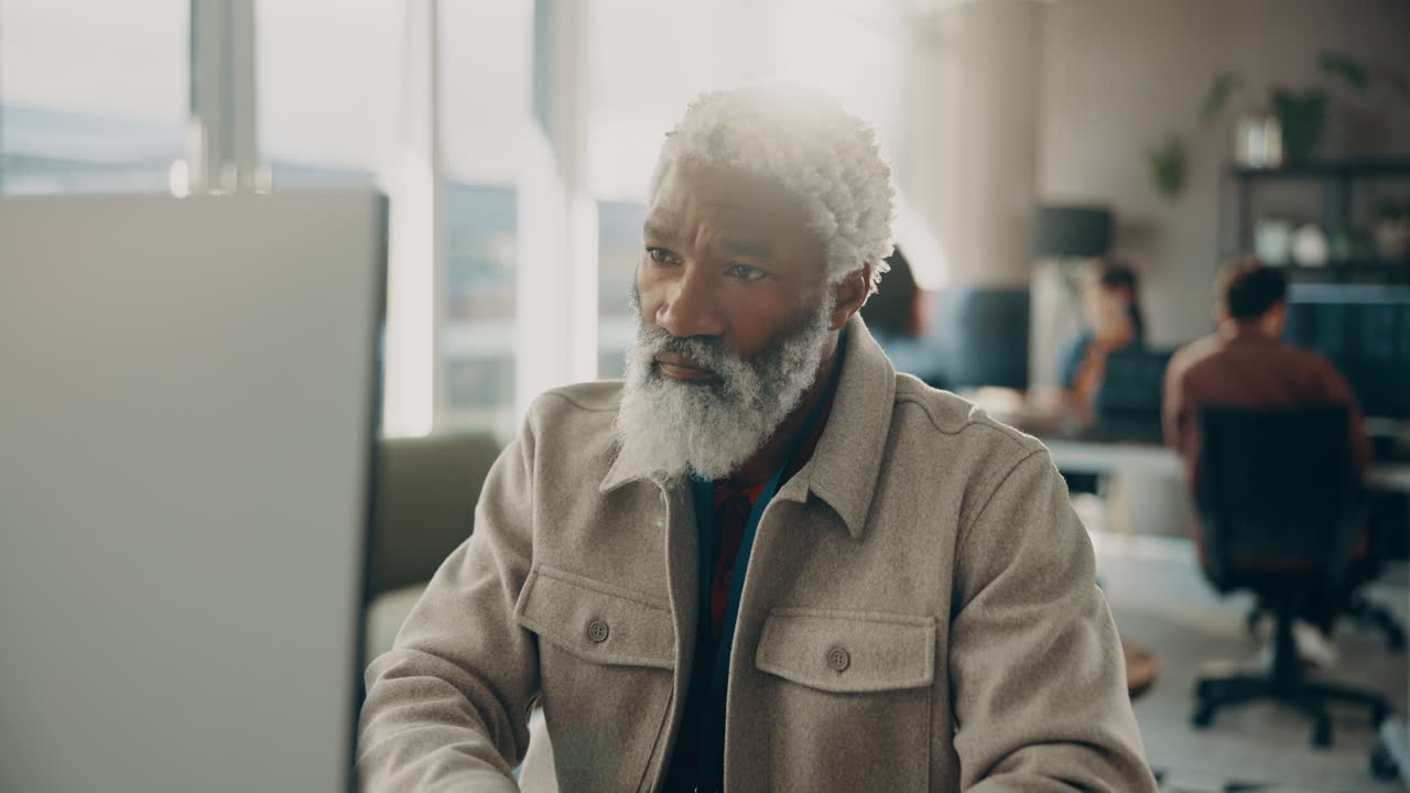 Senior Man Working in Office