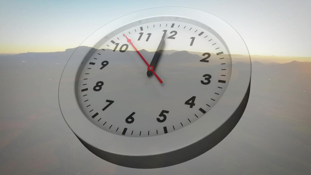 Analog clock floating tilting as seconds hand sweeping and revealing mountain sunrise showing time