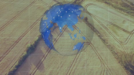 Animation-of-globe-over-agriculture-field