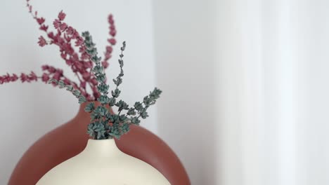 dried flowers in vases