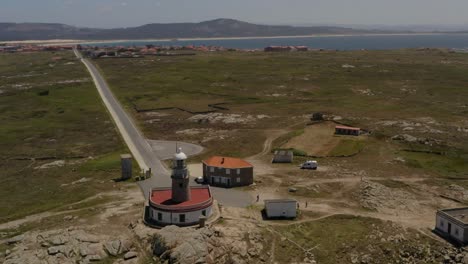 Road-to-the-lighthouse-off-the-Atlantic-coast,-Spain