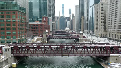 aerial view of bridge above chicago river - winter