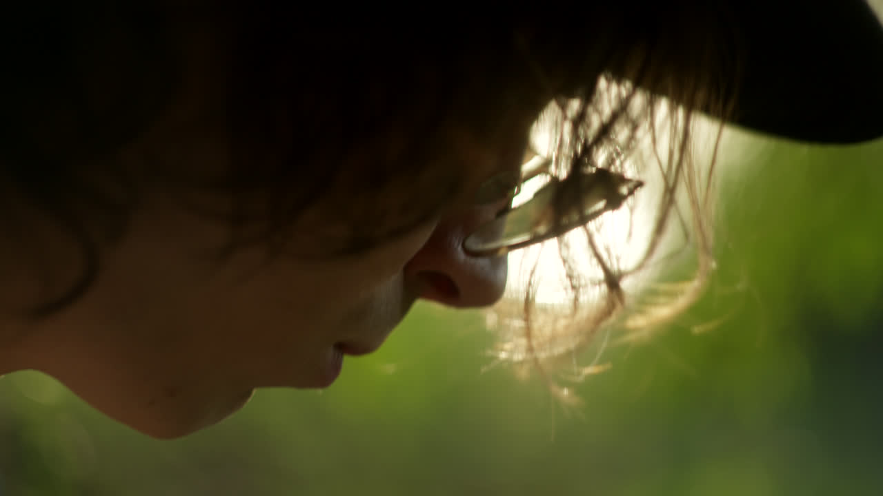 Close-up Profile of a Person Outdoors