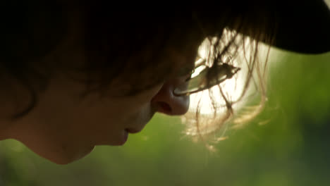 close-up profile of a person outdoors