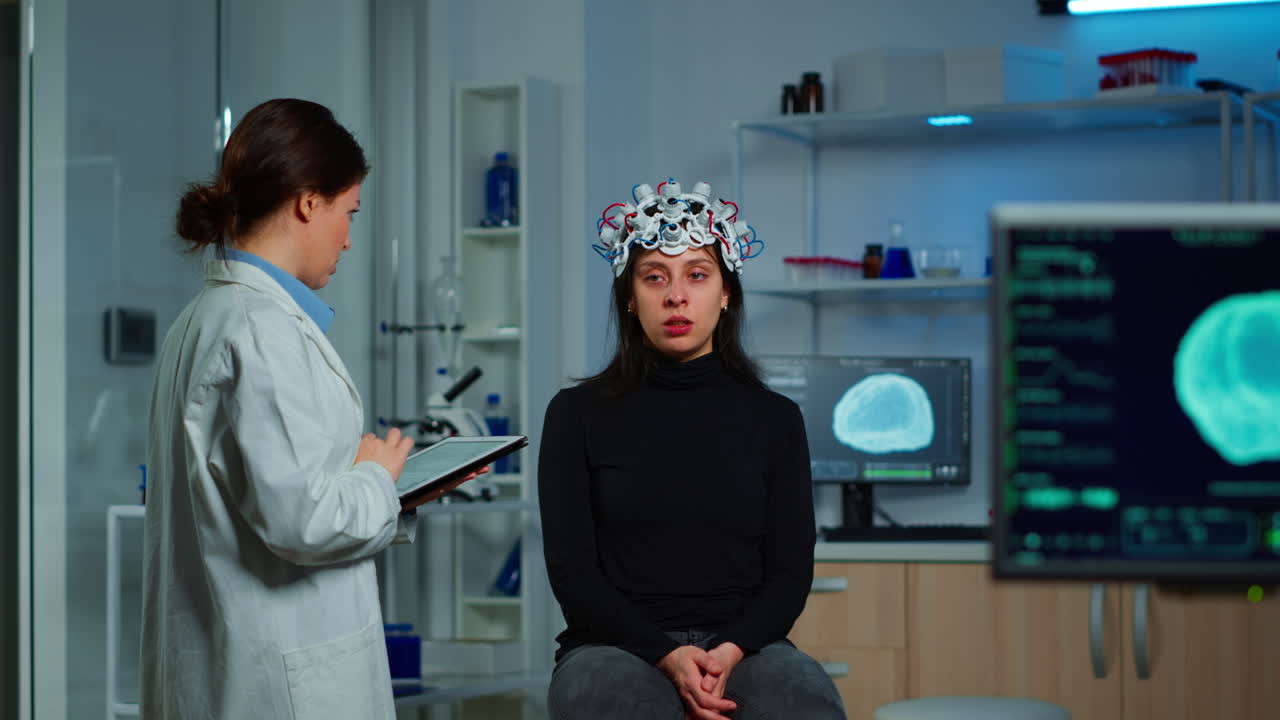 Researcher neurologist doctor asking patient's symptoms taking