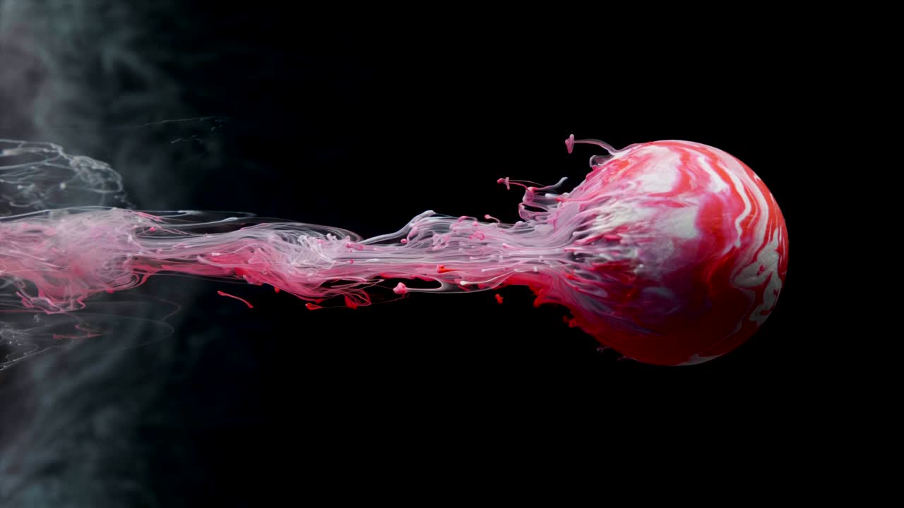 la pintura de tinta multicolor fluye lentamente de la pelota