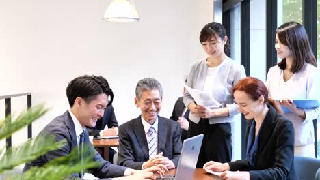 businesspersons having a meeting in an office