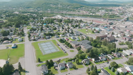 wide aerial shot captures the border between maine and edmundston, canada