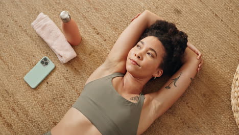 woman stretching on floor